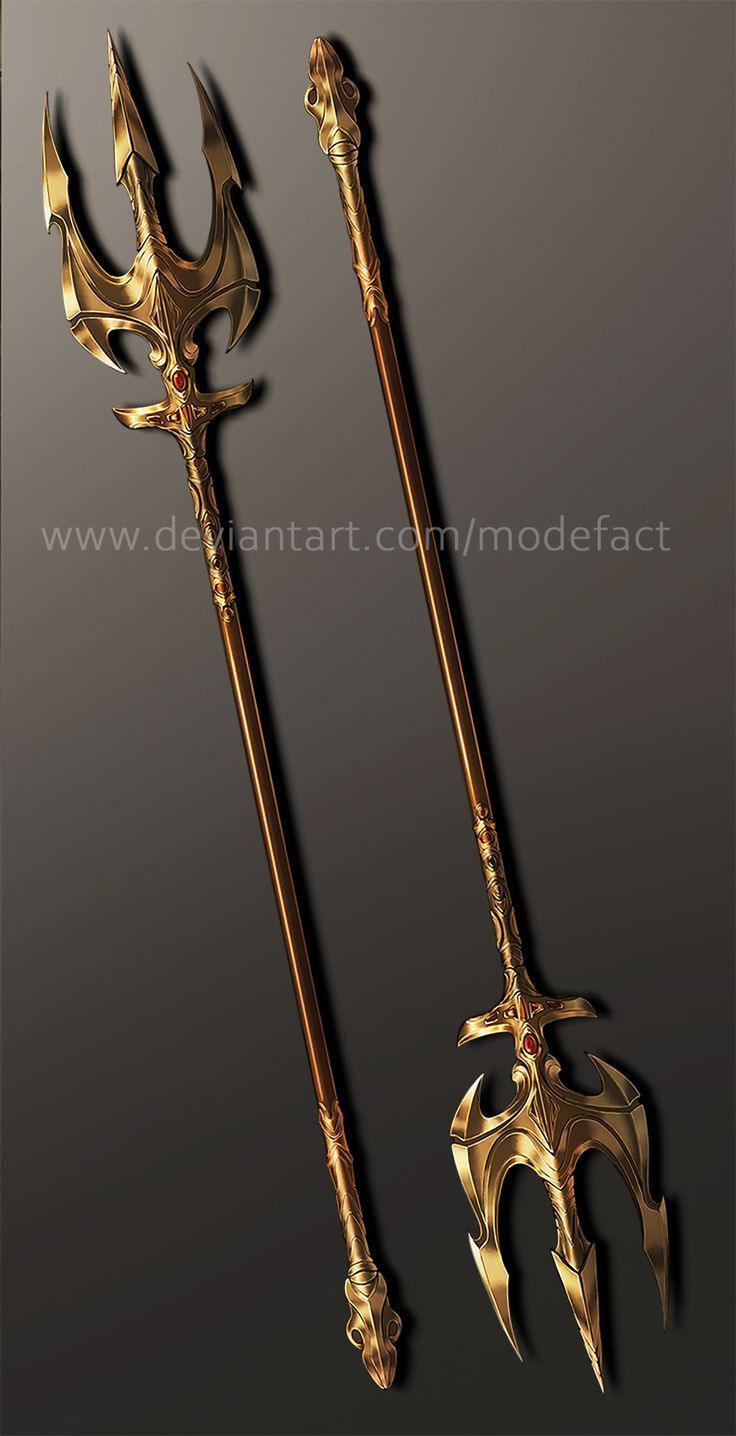 two gold colored swords on a gray background