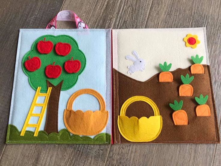 two felt book covers with pictures of farm animals and trees