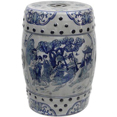 a blue and white vase with people on it