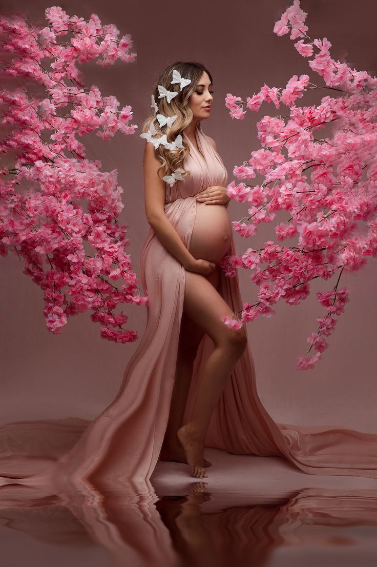 studio maternity cheery blossom session Pregnant Lady Photoshoot, Prego Photoshoot Ideas, Creative Maternity Shoot Ideas Outdoor, Pregnant Poses Photoshoot, Red Maternity Shoot, Women Pregnancy Photos, Maternity Photo Shoot Studio, Cherry Blossom Maternity Shoot, Girl Maternity Shoot Ideas