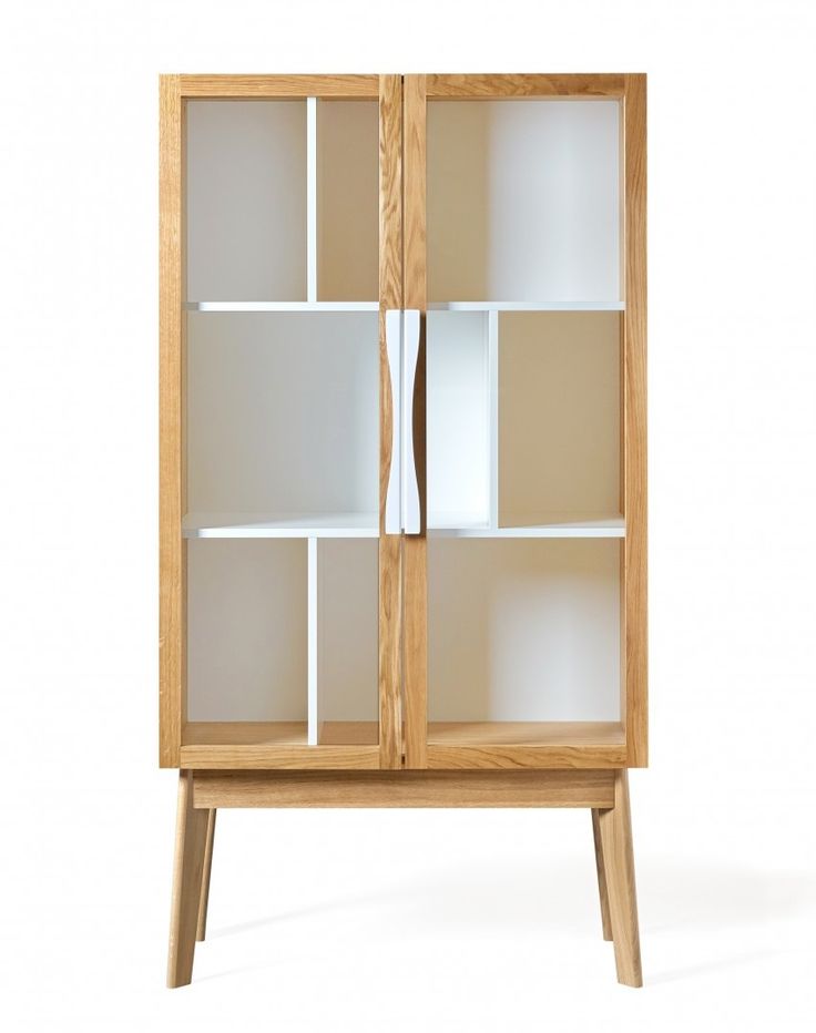 a wooden cabinet with glass doors and shelves