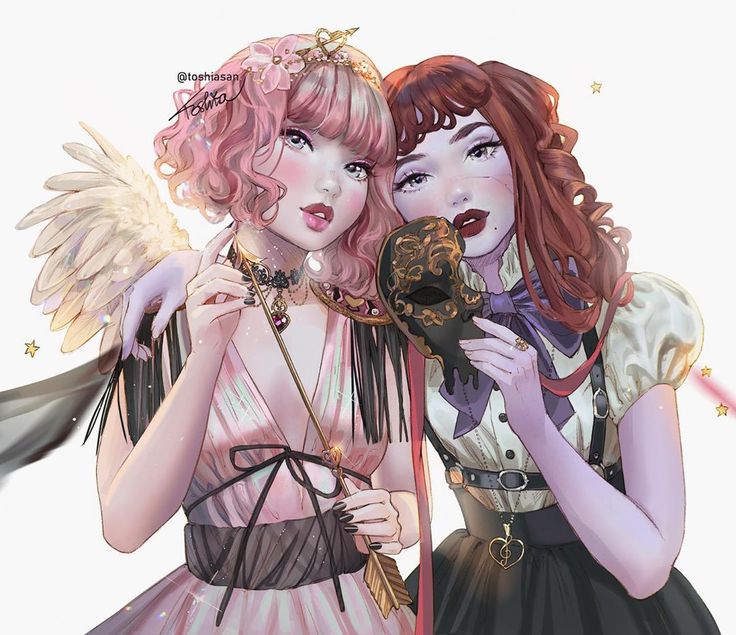 two beautiful young women standing next to each other with angel wings on their shoulders and one holding a mask