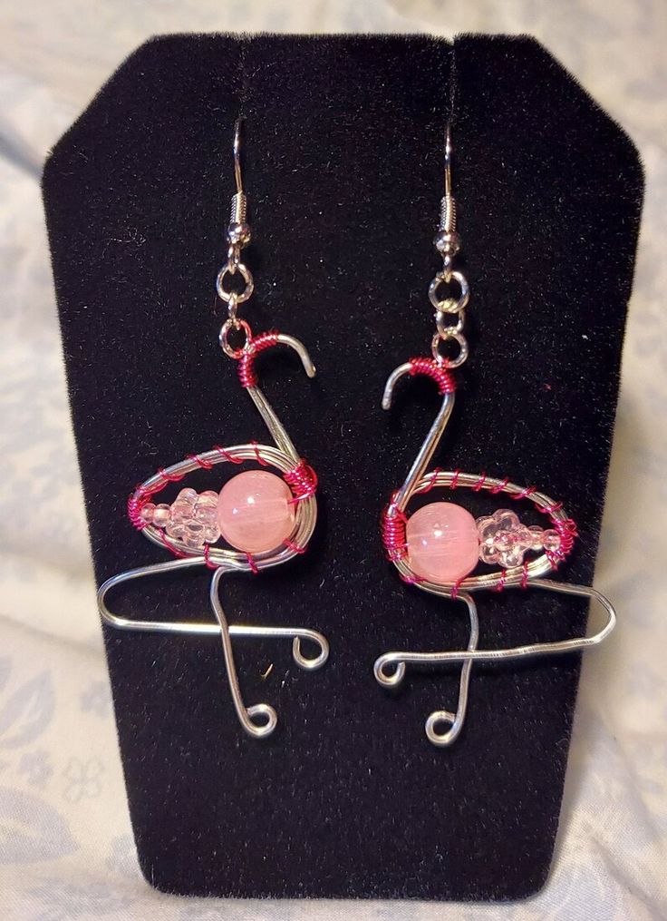 Pink Metal Clip-on Earrings For Gift, Pink Metal Clip-on Earrings As A Gift, Pink Wire Wrapped Earrings For Party, Party Pink Wire Wrapped Earrings, Whimsical Wire Wrapped Earrings For Party, Party-ready Adjustable Nickel-free Wrap Earrings, Nickel-free Adjustable Wrap Earrings For Parties, Adjustable Nickel-free Wrap Earrings For Party, Handmade Wire Drop Earrings