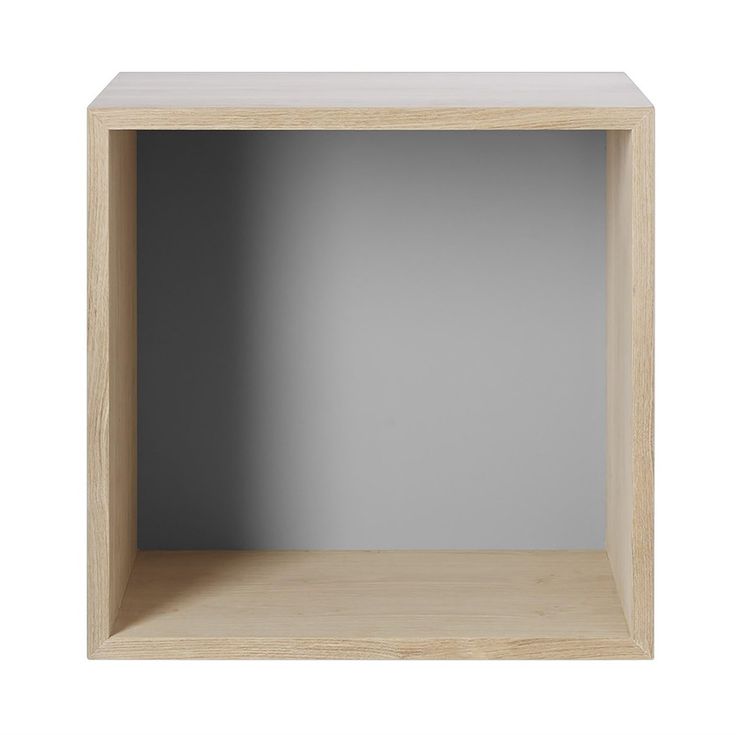 an empty wooden shelf on a white background