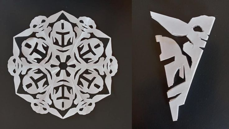 two pieces of paper cut to look like an ornament and another piece of art