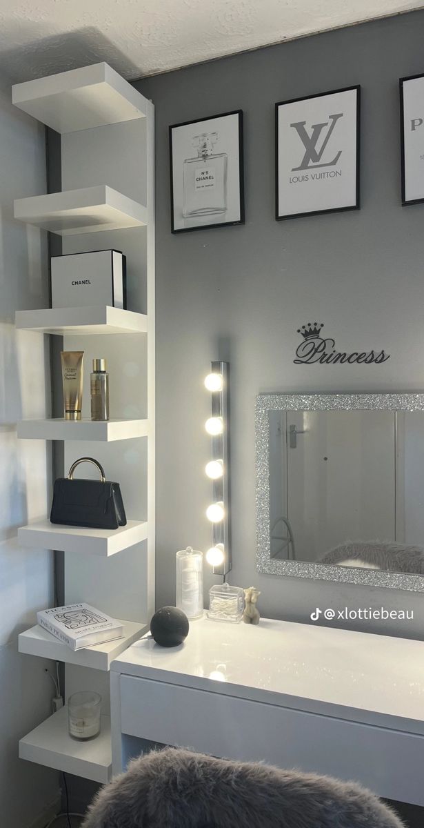 a white desk topped with a mirror and lights