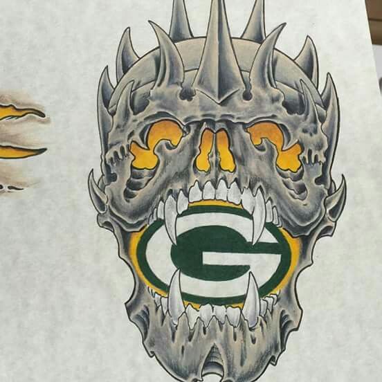 the green bay packers logo is painted on a piece of paper that has been drawn onto