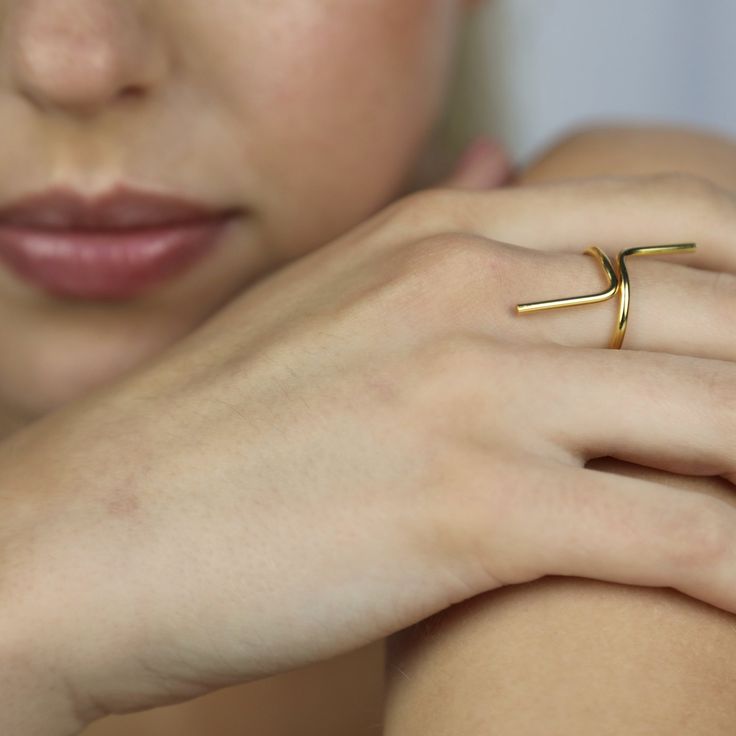 From refined, timeless shapes to modern characters with edge meet FAYE RING - handcrafted and shape may vary slightly making pieces one of a kind. Available in different finishes. Material Brass / copper (nickel free) Sterling Silver Custom 14k gold pieces available upon a 50% deposit (non refundable) DIMENSION - Adjustable WEIGHT - 0.2oz Modern Handmade Yellow Gold Rings, Modern Yellow Gold Ring With Unique Design, Modern Brass Ring With Polished Finish, Modern Brass Rings With Polished Finish, Modern Jewelry With Unique Design And Open Band, Modern Midi Rings In Recycled Gold As Gift, Modern Gold Midi Rings In Recycled Gold, Modern Gold Rings With Unique Design, Minimalist Hand Forged Gold Midi Rings