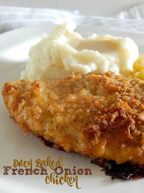 a piece of chicken with mashed potatoes and gravy on a white plate