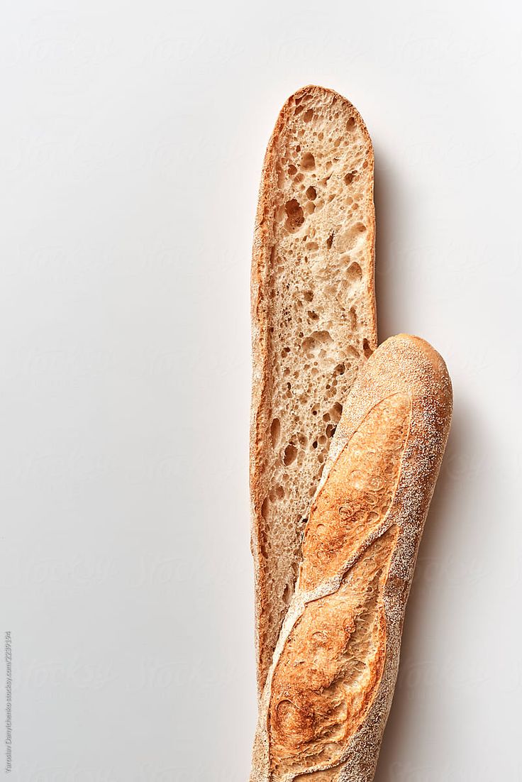 a loaf of bread sitting on top of a white table