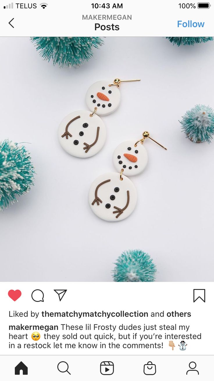 two snowman earrings on top of each other