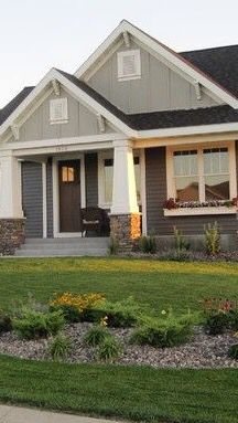 a house that is sitting in the grass