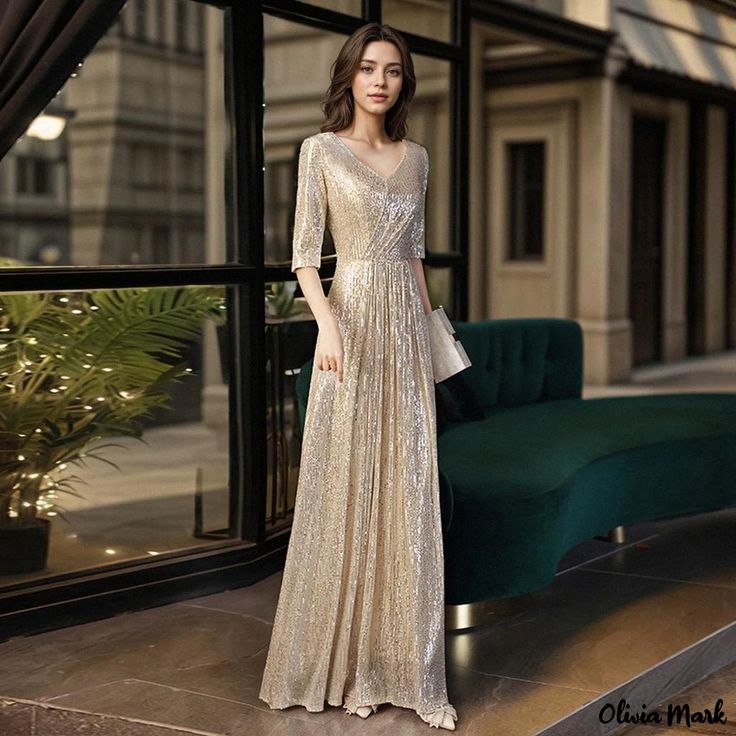 Olivia Mark - Exquisite Golden Evening Gown for Formal Events and Hosting Functions Gold Long-sleeve Evening Dress For Gala, Gold Long Sleeve Evening Dress For Formal Occasions, Gold Long Sleeve Gala Evening Dress, Gold Long Sleeve Dress For Gala, Gold Long Sleeve Gala Dresses, Glamorous Gold Festive Evening Dress, Gold Formal Dress For Festive Occasions, Festive Gold Gown For Prom, Gold Sequined Long Sleeve Gown