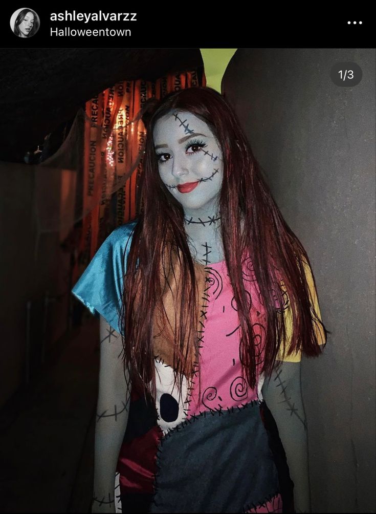 a woman with red hair and makeup is dressed as a skeleton