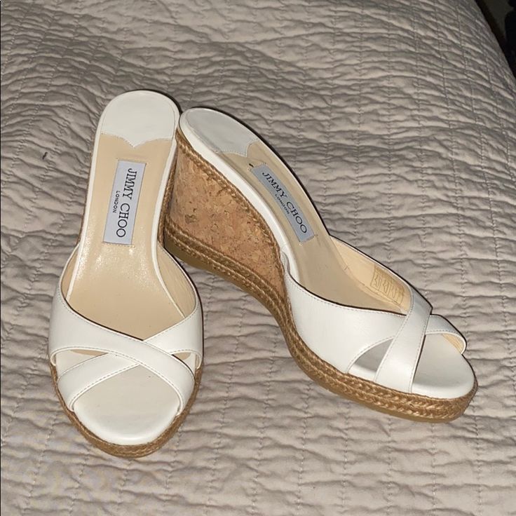 Jimmy Choo Wedge Slides In Off White/Bone Color Leather, With Cork Espadrille Style Wedge Heel. Never Worn Outside! The Perfect Shoe For Tan Pedicured Toes! Chic White Slip-on Wedge Sandals, White Leather Slip-on Wedge Sandals, White Cushioned Wedge Sandals Slip-on, White Cushioned Wedge Slip-on Sandals, White Cushioned Slip-on Wedge Sandals, White Cushioned Slip-on Heels, White Wedge Sandals With Cork-bed Midsoles, White Slip-on Heels With Cushioned Footbed, White Wedge Sandals With Branded Insole