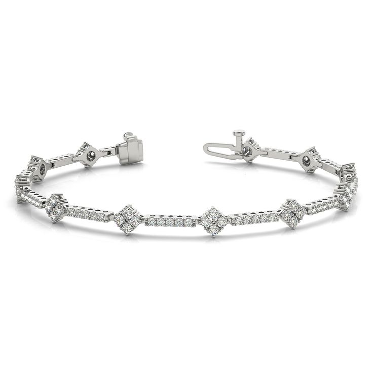 The classic design tennis diamond bracelet displays glittering petite round cut diamonds mounted in the design of kite pattern linked together by thin metal strips studded with petite diamonds. The delicate diamond bracelet comes with a sturdy clasp for everlasting allure. The petite round diamond tennis bracelet showcases dazzling assortment of 1.29 carat total weight, SI2 clarity and G color grafted precisely in pave and prong setting. This classic diamond bracelet for women can also be acquired in numerous other metals. Total number of diamonds – 99. Avail easy financing scheme to buy now and pay later according to your convenience. Conflict free natural diamonds. Receive your merchandise within 3-5 business days via FedEx or UPS, which delivers only signed packages maintaining co Silver Anklet, Bracelet Display, Silver Anklets, Tennis Bracelet Diamond, Bracelet Collection, Best Diamond, Design Silver, Anklet Jewelry, Diamond Bracelets