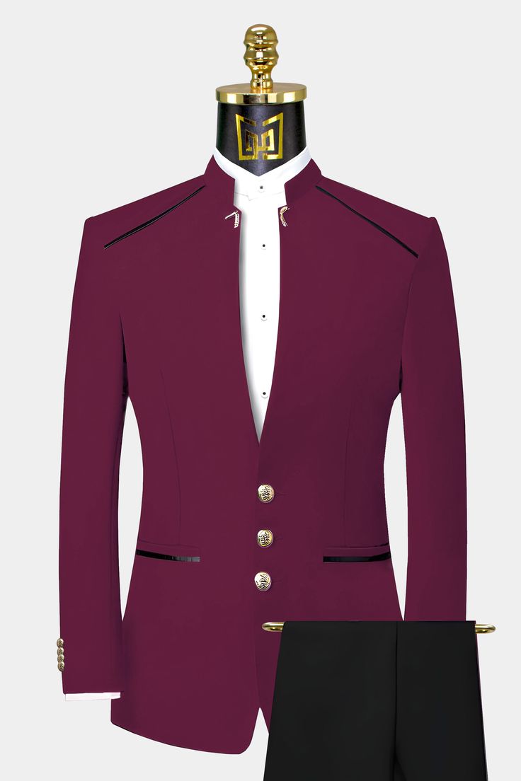 Want to try a different outfit on slightly bolder lines? Check out this exotic burgundy mandarin collar suit. The ensemble is sure to get you noticed for all the right reasons while upgrading your wardrobe to the next level with ease. Featuring beautiful gold embellishments on the collar and buttons. The burgundy Asian-style jacket is styled in a chic manner with the fashionable black trim creating an interesting contrast. The fabric is smooth, yet durable, so you don’t have to worry about rips Burgundy Groom Suit And Groomsmen, Burgandy Suit Groom, Mandarin Collar Suit, Tuxedo Groomsmen, Guys Prom, Grooms Suits, Prom Outfits For Guys, Prom Attire, Suit Prom