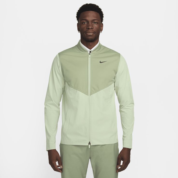 Stay dry and comfortable during wet-weather tee times in this convenient packable jacket. It's stretchy through the arms and lower body, so you can putt or drive without anything holding you back. Nike Functional Track Jacket For Light Sports, Nike Technical Track Jacket With Moisture-wicking, Green Moisture-wicking Athleisure Track Jacket, Functional Green Track Jacket For Gym, Sporty Green Moisture-wicking Windbreaker, Green Moisture-wicking Windbreaker For Sports, Green Moisture-wicking Sports Windbreaker, Spring Running Track Jacket, Green Nike Windbreaker For Sports