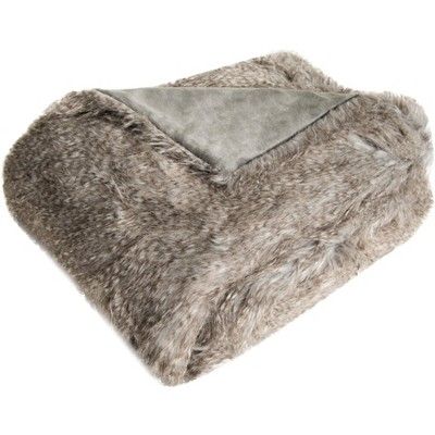 a blanket with grey fur on it