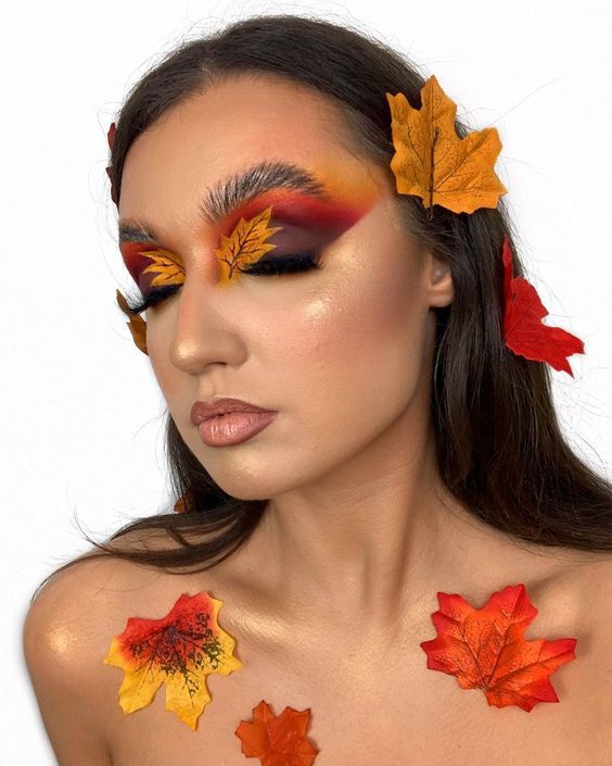 Autumn Leaf Makeup, November Makeup Ideas, Autumn Goddess Costume, Autumnal Makeup Looks, Autumn Witch Makeup, Fall Creative Makeup, Fall Leaves Makeup, Fall Color Makeup, Leaf Eye Makeup