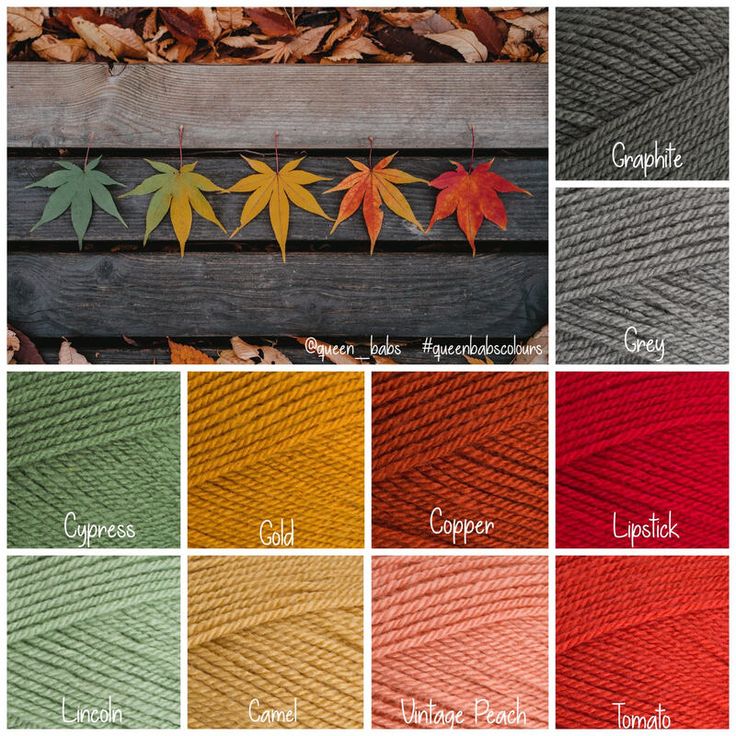 different colors of yarn and leaves on a wooden surface with the words autumn written across them