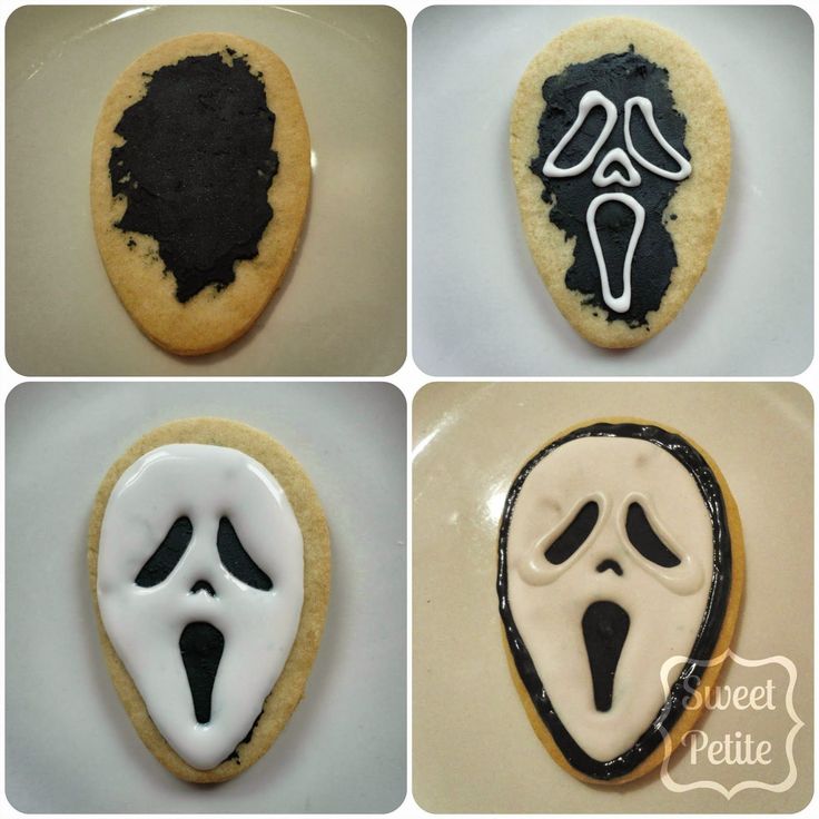 cookies decorated to look like halloween characters with black and white icing on them are shown