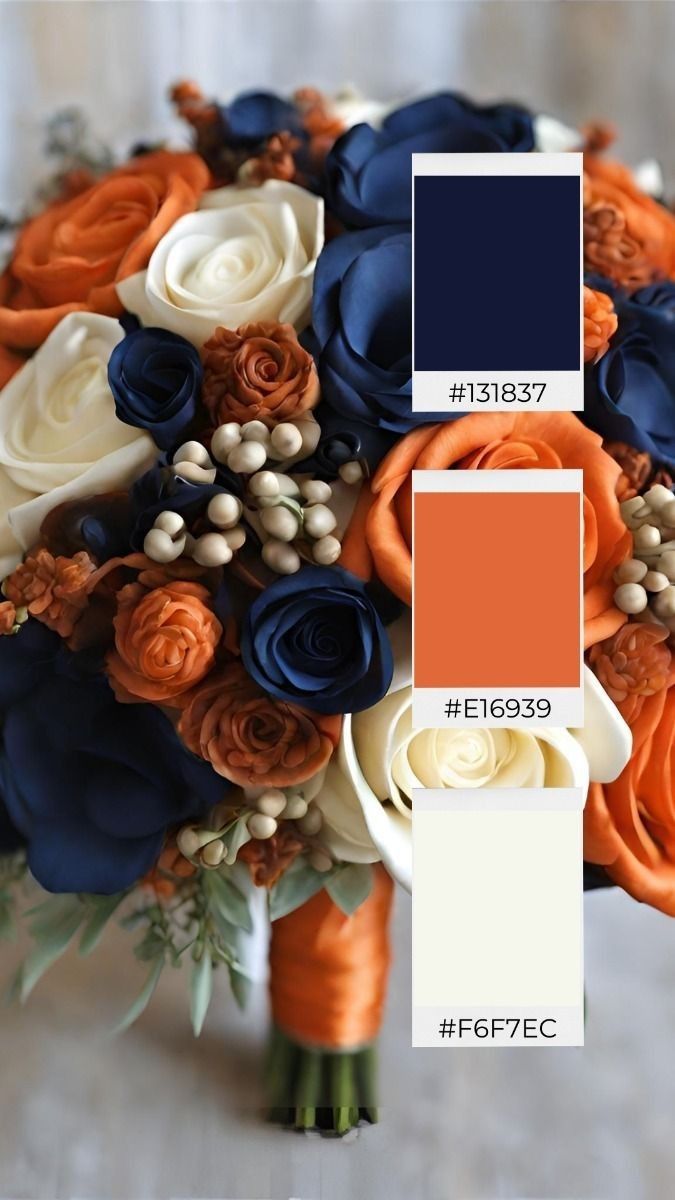 a wedding bouquet with orange, blue and white flowers is shown in this color scheme