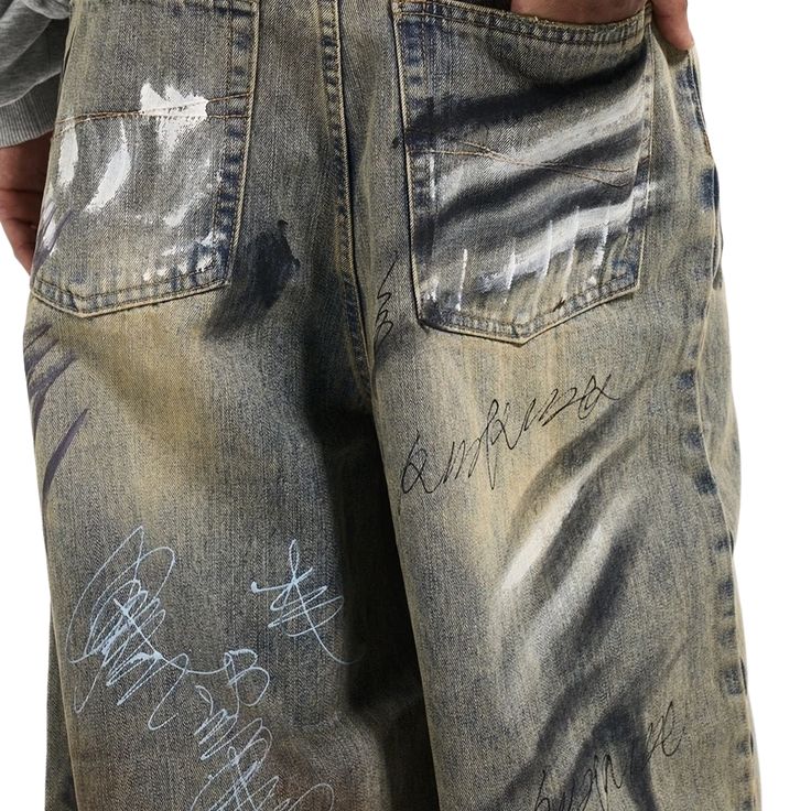 Indulge in the sophistication of our Urban Canvas Relaxed Splash Denim. Designed for the modern urban lifestyle, this premium denim offers a relaxed fit with a stylish splash pattern. Perfect for those seeking a blend of comfort and fashion. Upgrade your wardrobe today. Casual Pre-washed Jeans For Streetwear, Urban Style Baggy Acid Wash Jeans, Urban Acid Wash Jeans For Fall, Casual Denim Bottoms With Graffiti Print, Casual Graffiti Print Jeans For Streetwear, Casual Jeans With Graffiti Print For Streetwear, Denim Blue Relaxed Fit Grunge Jeans, Grunge Style Relaxed Fit Denim Blue Jeans, Grunge Relaxed Fit Denim Blue Jeans