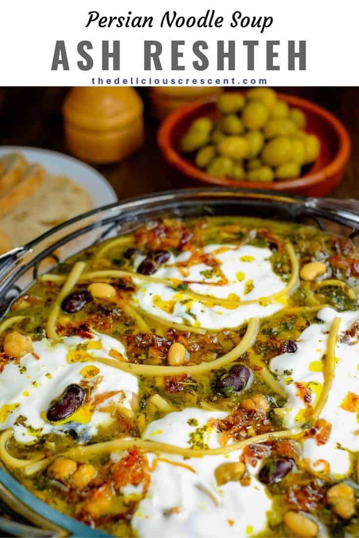 the dish is prepared and ready to be eaten with sour cream on top, olives in