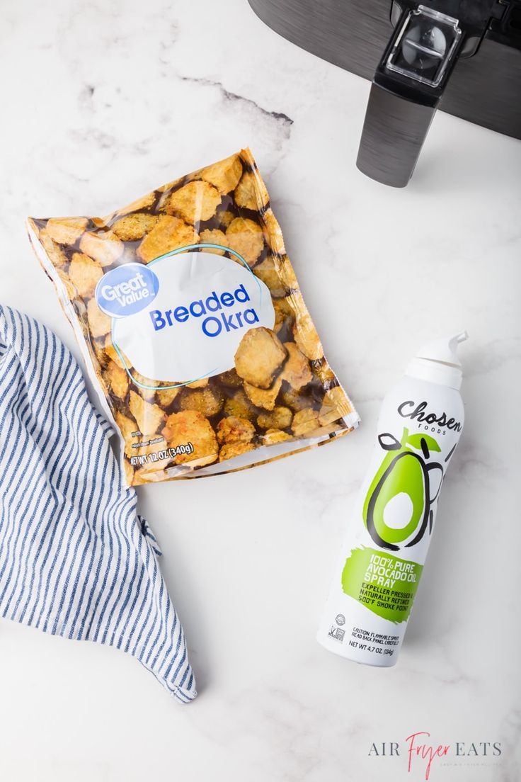 the ingredients to make breaded olives are laid out on a counter next to an air freshener bottle