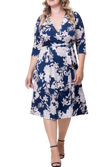 Take the guesswork out of getting ready for your next event with this effortless wrap dress that has an allover floral print and breezy A-line silhouette. 44" length (size 2X) True wrap style with side tie closure Surplice V-neck Three-quarter sleeves Unlined 95% polyester, 5% spandex Machine wash, dry flat Made in the USA of imported fabric Floral Print Dress With Surplice Neckline For Brunch, Flowy Floral Dress With Surplice Neckline, Feminine Floral Print V-neck Wrap Dress, V-neck Floral Print Wrap Dress For Garden Party, Floral Print V-neck Wrap Dress For Garden Party, Chic Floral Print Wrap Dress With Surplice Neckline, Fitted Floral Dress With Surplice Neckline, Garden Party Floral Wrap Dress With Surplice Neckline, Chic Floral Print Wrap Dress For Garden Party