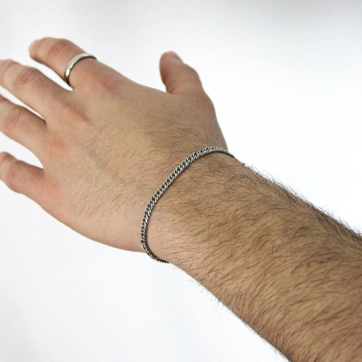 A minimalist, classy, and timeless 4mm curb stainless steel chain bracelet that will not tarnish or rust over time, even when worn in the water. 💎Free shipping on all orders💎Waterproof and non-tarnish💎Packaging that is ready to offer as a gift💎Customizable and adjustable chain length A durable, waterproof, and non-tarnish silver chain bracelet This stainless steel handmade chain bracelet is not only waterproof but also resistant to tarnishing and will maintain its shine over the years. You c Classic Cuban Link Bracelet With Curb Chain For Everyday, Classic Cuban Link Silver Bracelet, Minimalist Cuban Link Bracelet For Everyday, Classic Cuban Link Metal Bracelet For Everyday Wear, Classic Sterling Silver Curb Chain Bracelet For Everyday, Classic Cuban Link Metal Bracelet For Everyday, Minimalist Cuban Link Bracelet, Classic Metal Cuban Link Bracelet For Everyday, Everyday Minimalist Cuban Link Bracelet