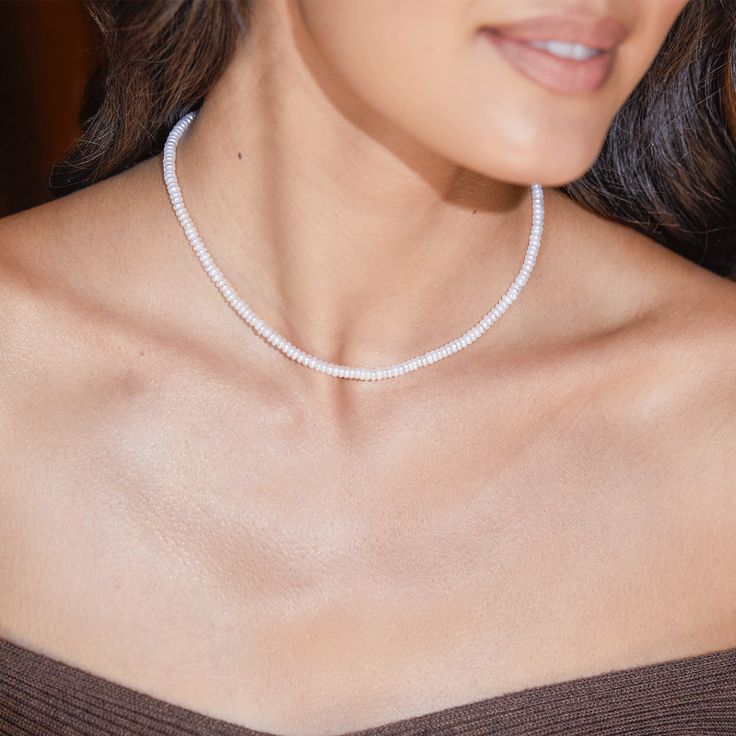 We turned the iconic pearl strand into a modern classic! Not only is our Freshwater Pearl Necklace spectacular alone for a minimalist classic cool vibe, but it's also the perfect length to add a feminine touch to your chain game. Pairs beautifully with any of our connectors and charms for an extra stunning personalized effect.

Size: 4.3mm Pearls 
15” with 1” extender chain 
Genuine Freshwater Pearls
14K Gold Lobster Clasp Closure
Made in Los Angeles
Lifetime Guarantee Spiritual Necklace, Pearl Strands Necklace, Cross Earrings Studs, Wear Pearls, Cuban Link Chain Necklaces, Pearl Strand, Diamond Solitaire Necklace, Freshwater Pearl Necklace, Custom Name Necklace