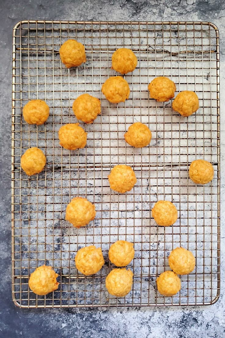 some food that is sitting on a wire rack in the middle of a counter top