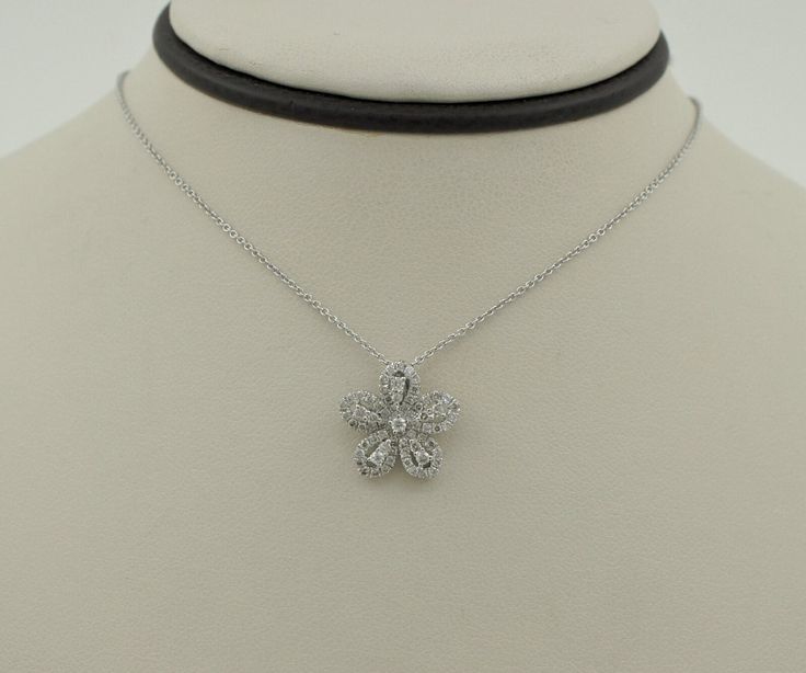 Beautiful handmade 14K solid white gold round cut natural diamonds flower pendant on 14K solid white gold cable chain necklace. Made by Gabriel & Co. Would be a perfect wedding/ anniversary gift for the one you love! Chain measures approx.: 18.5 inches. Chain thickness approx.: 0.95mm Pendant measures approx.: 13.45mm x 13.3mm Total diamond weight approx.: 0.40 ct  Total necklace weight approx.: 3.4g Hallmarks: 14K Gabriel & Co. SO82837 Will be placed into a suitable gift box. Free shipping with Elegant Platinum Flower Jewelry, Elegant Flower-shaped Platinum Jewelry, Flower Shaped Diamond Necklace For Anniversary, Flower-shaped Diamond Necklace For Anniversary, White Gold Flower Shaped Necklace For Anniversary, White Gold Flower Necklace For Anniversary, Wedding Necklace With Single Cut Diamonds In Flower Shape, White Gold Diamond Necklace With Flower Shape For Anniversary, Anniversary Diamond Necklace With Flower Pendant