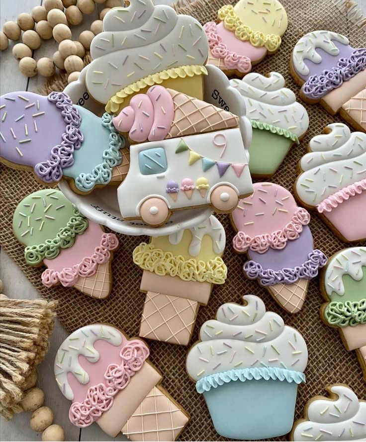 some decorated cookies are sitting on a table