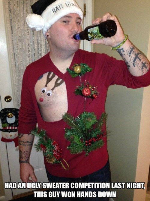 a man in a santa hat drinking from a bottle with christmas decorations on his shirt