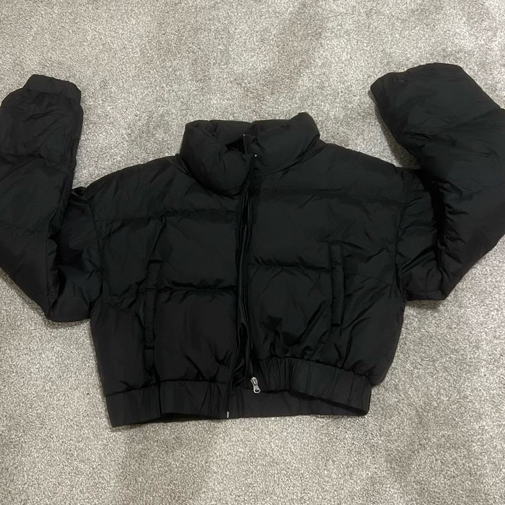 Never Worn Didn’t Come With A Tag But It’s A M Black Puffer Jacket With Pockets For Fall, Trendy Black Puffer Jacket With Pockets, Black Long Sleeve Puffer Jacket For Fall, Trendy Black Puffer Jacket For Outdoor, Trendy Black Puffer Jacket For Streetwear, Black Spring Puffer Jacket With Pockets, Black Puffer Jacket With Padded Collar For Fall, Black Fall Puffer Jacket With Padded Collar, Black Puffer Jacket For Spring Outdoor