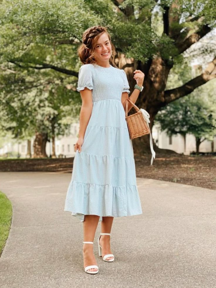 Beautiful gingham dress with comfy, stretchysmocked bodice, fun tie back detail and fun flowy skirt. Available in two gorgeous colors. Self 100% Cotton, Lining 100% Polyester Aprox. Measurements in inches: XS:Length-47 |Bust-28 |Waist-24 S:Length-47 |Bust-30 |Waist-26 M:Length-47 |Bust-32 |Waist-28 L:Length-48 |Bust-34 |Waist-30 XL:Length-48 |Bust-36 |Waist-32 Modest Dresses Casual Jessakae, Modesty Outfits Summer Casual, Modest Girly Outfits Christian, Modest Europe Outfits, Modest Teenage Girl Outfits, Cute Modest Outfits Casual, Modest Sundress, Apostolic Fashion Church, Sun Dresses Modest