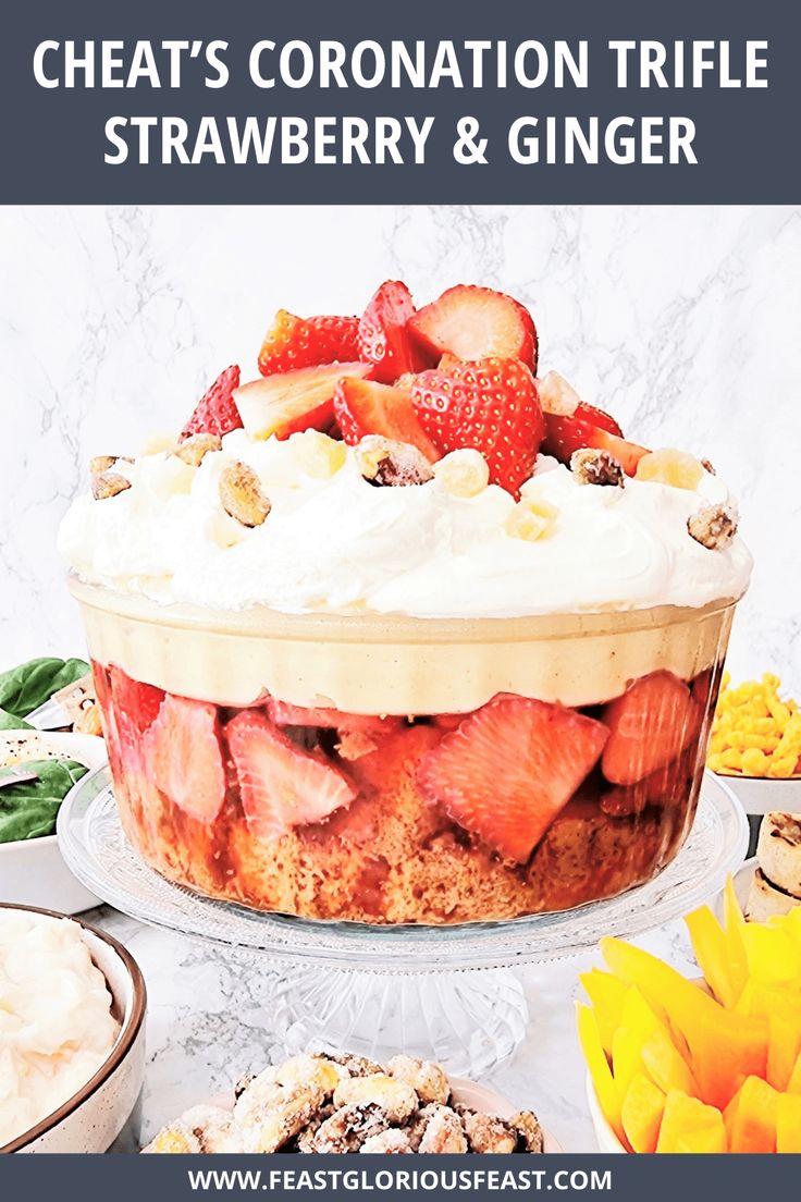 a close up of a cake with strawberries on top and other desserts in the background