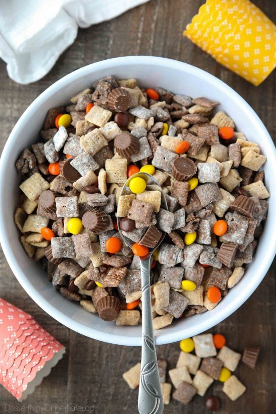 a white bowl filled with cereal and candy