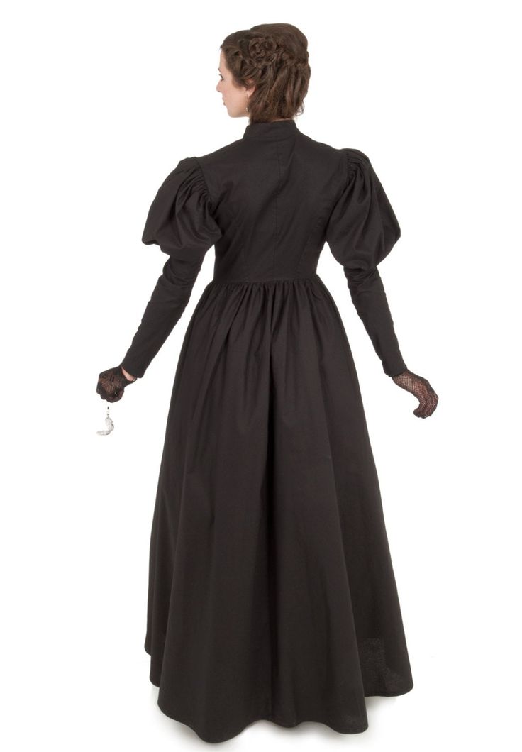 This is our top selling dress! Throughout the Victorian period, mourning would take place for two and a half years! During the first year, black was the only color worn by a widow. This mourning gown in all black has the silhouette of a classic Victorian style. The dress has a fitted waist with a V-shape in front. This dress has leg-o-mutton sleeves and a full skirt. Dress has high collar and front button closure. All in black, this dress is suitable for any woman in mourning. Hand wash or machi Black Victorian Dress For Fall Costume Party, Black Victorian Dress For Fall Costume Events, Black Victorian Dress With Long Sleeves For Fall, Black Long Sleeve Victorian Dress For Fall, Black Victorian Dress With Long Sleeves, Black Long Sleeve Victorian Dress, Victorian Formal Dresses For Fall, Black Regency Style Dress For Costume Party, Black Regency Dress For Costume Party