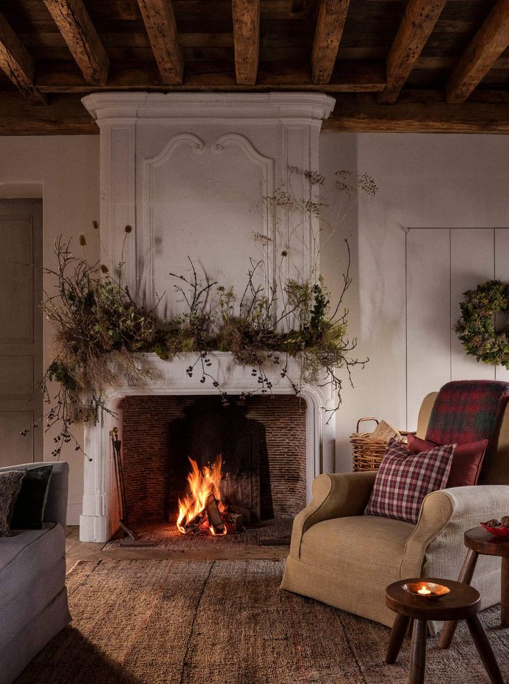 a living room filled with furniture and a fire place