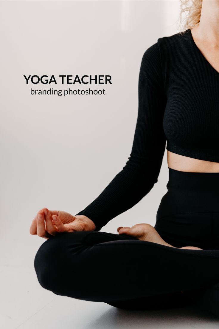 a woman is sitting in the middle of a yoga pose