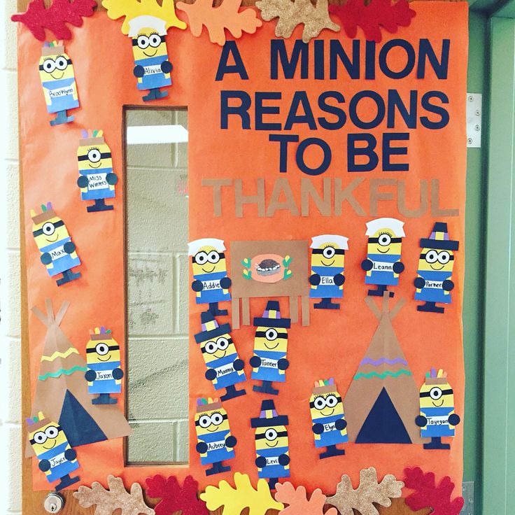 a bulletin board decorated with paper cutouts and words that read, a minion reason to be thanks