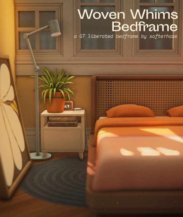 a bed room with a neatly made bed and a plant