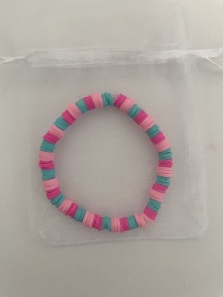 Handmade beaded bracelet Pink Bracelet With Colorful Beads, Pink Colorful Beaded Bracelets, Pink Beaded Bracelets With Round Beads, Pink Beaded Bracelets As Fashion Accessory, Handmade Casual Heishi Beads Stretch Bracelet, Casual Handmade Heishi Beads Stretch Bracelet, Handmade Heishi Beads Bracelets, Handmade Heishi Beads Round Bracelets, Casual Pink Bracelets With Large Beads