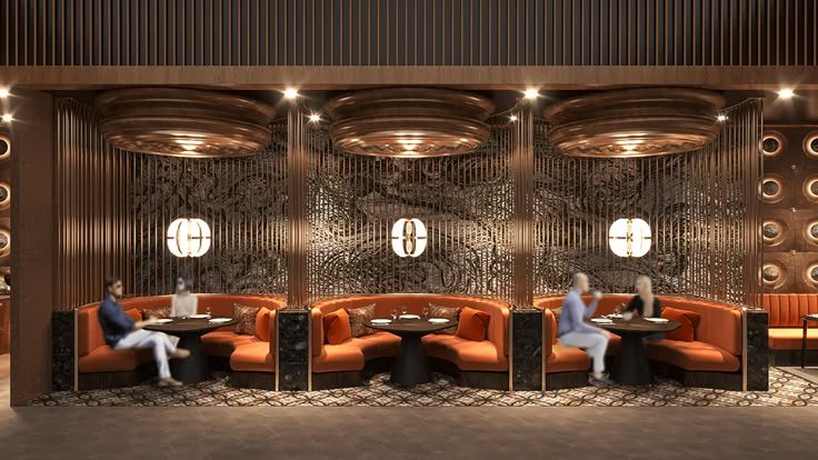 two people sitting at round tables in a room with circular mirrors on the wall and orange couches