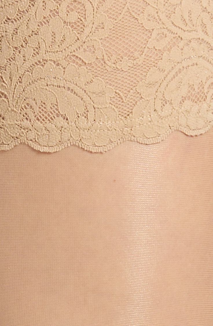 These smooth, soft stockings have a sophisticated matte finish and stay put with grippy lace bands. 87% polyamide, 13% elastane Machine wash cold, line dry Made in Austria Hosiery Stretch Lace Stockings With Lace Trim, Elegant Stretch Stockings With Lace Trim, Elegant Stretch Lace Trim Hosiery, Elegant Stretch Legwear With Lace Trim, Stretch Legwear For Formal Occasions, Elegant Fitted Hosiery With Lace Trim, Elegant Beige Micro-elastic Hosiery, Elegant Stretch Lace Bottoms, Elegant Stretch Lace Legwear