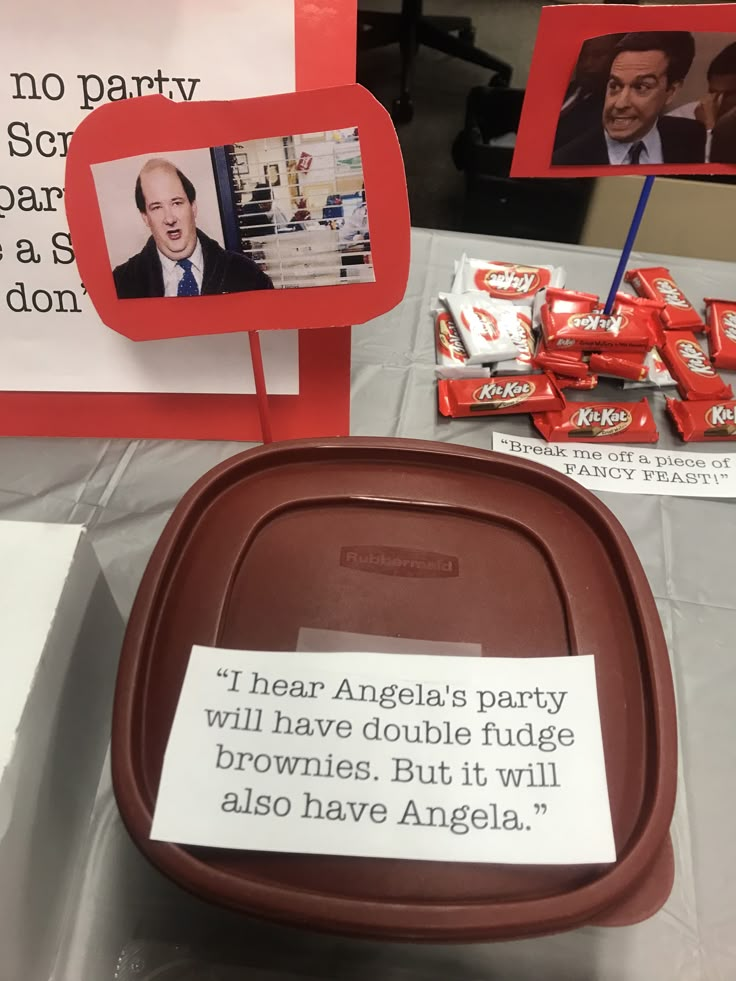 a table topped with chocolate candies and signs